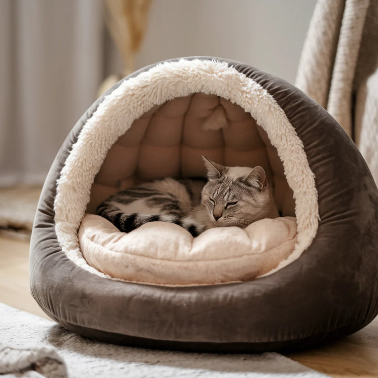 Cozy and plush cat bed with soft cushions, perfect for your feline friend to relax and sleep comfortably. Ideal for creating a peaceful retreat for your cat with a soothing, warm environment.